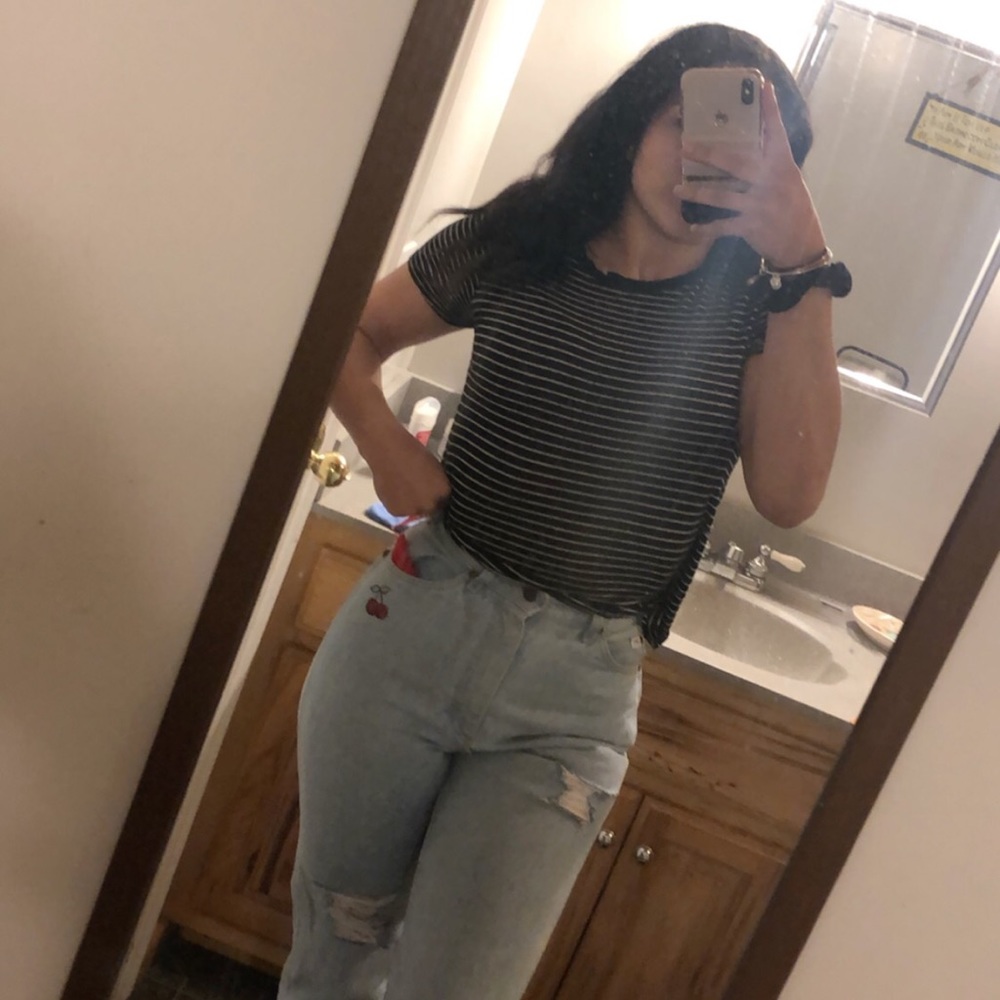 Designed and distressed mom jeans
